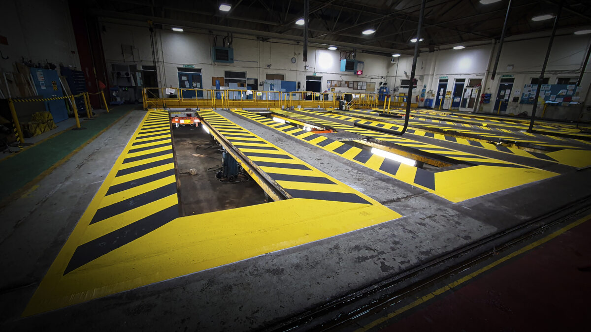 floor coating paint in yellow and black